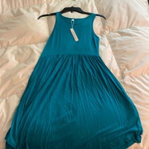 Sleeveless teal summer dress with pockets!